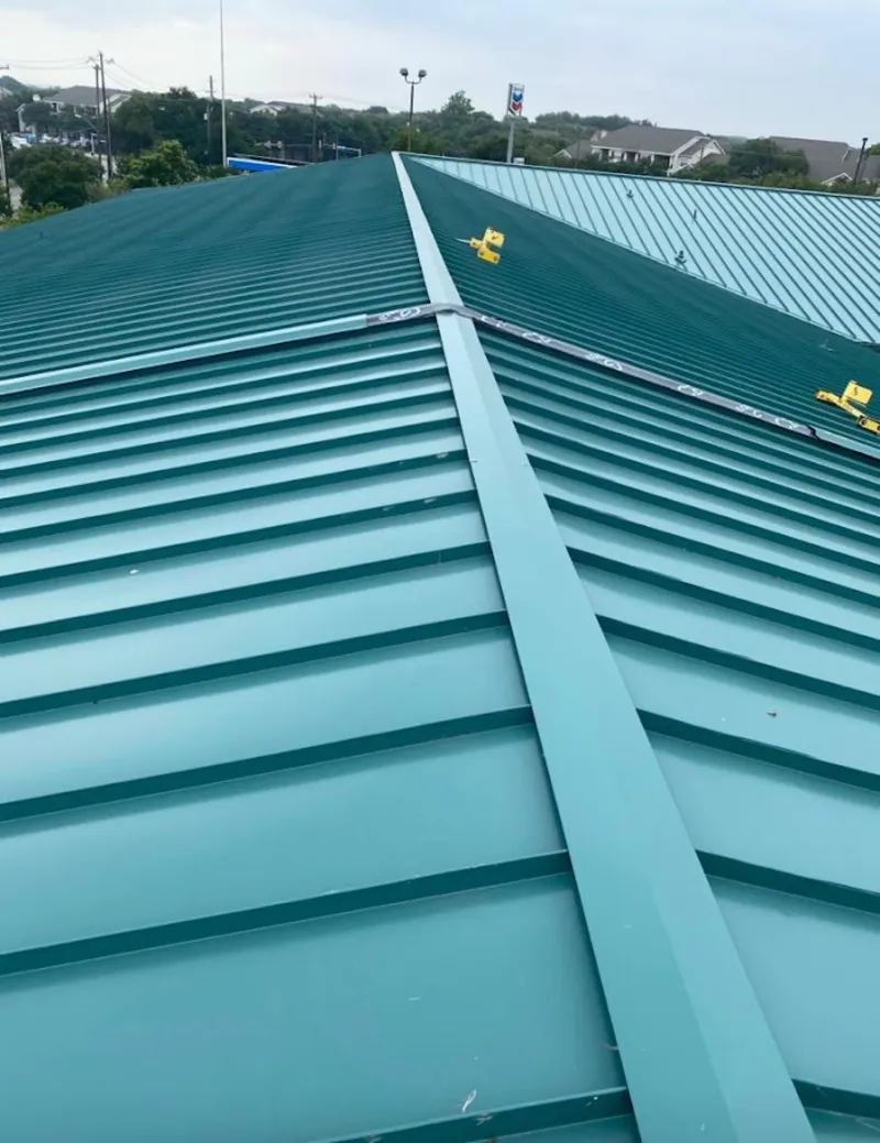 Green commercial metal roof ridge and valley for Metal Roof Repair in West Puente Valley