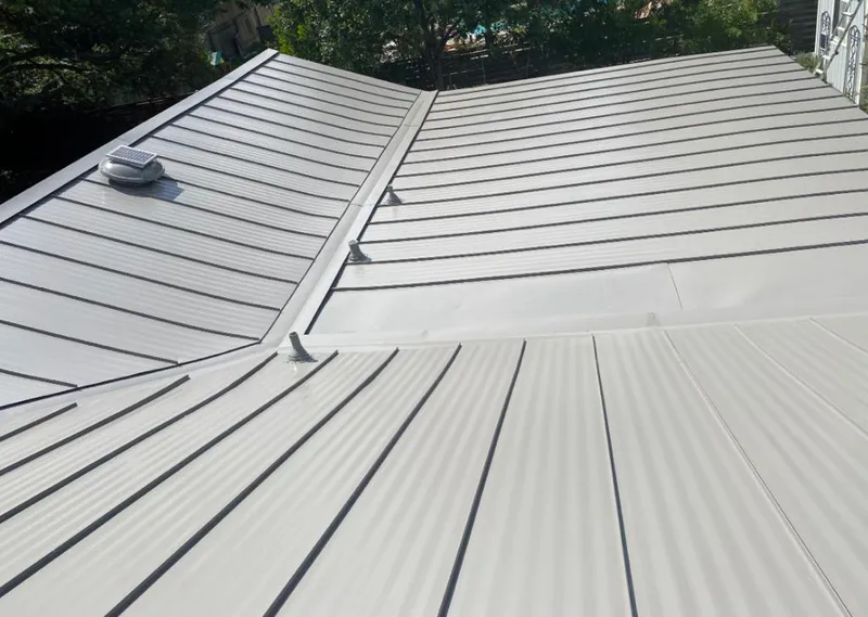 Solar attic fan installed on a metal roof for Roof Ventilation in West Puente Valley